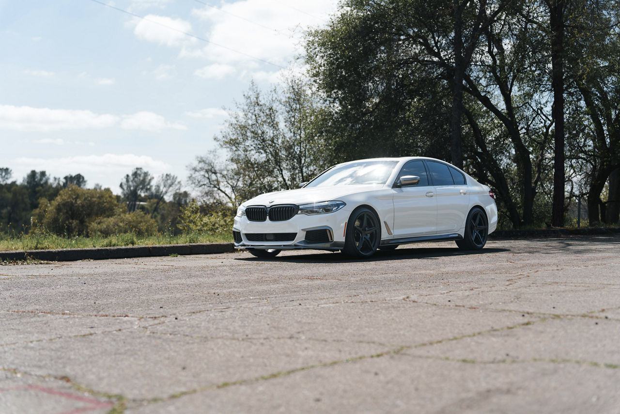 2020 BMW M550i on black staggered TSW Esprit wheels