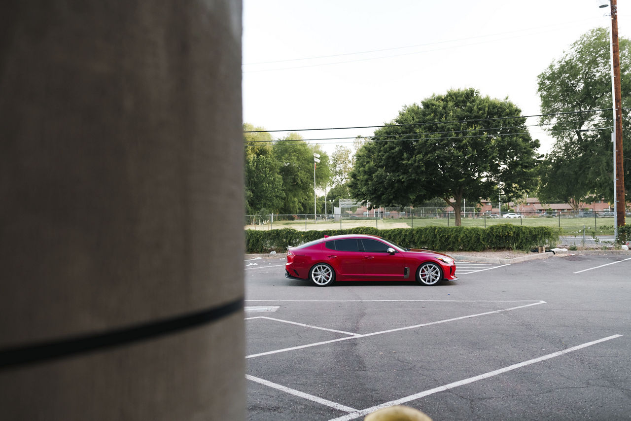 2021 Kia Stinger at stock height on square TSW IMOLA wheel setup