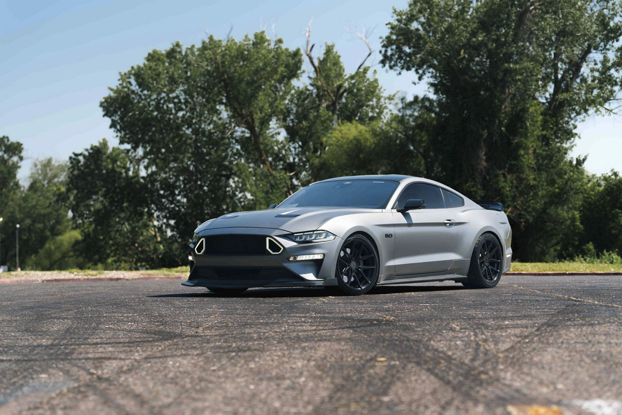 2019 Ford Mustang on TSW Imola wheels with 305/30R19 rear Nitto tires